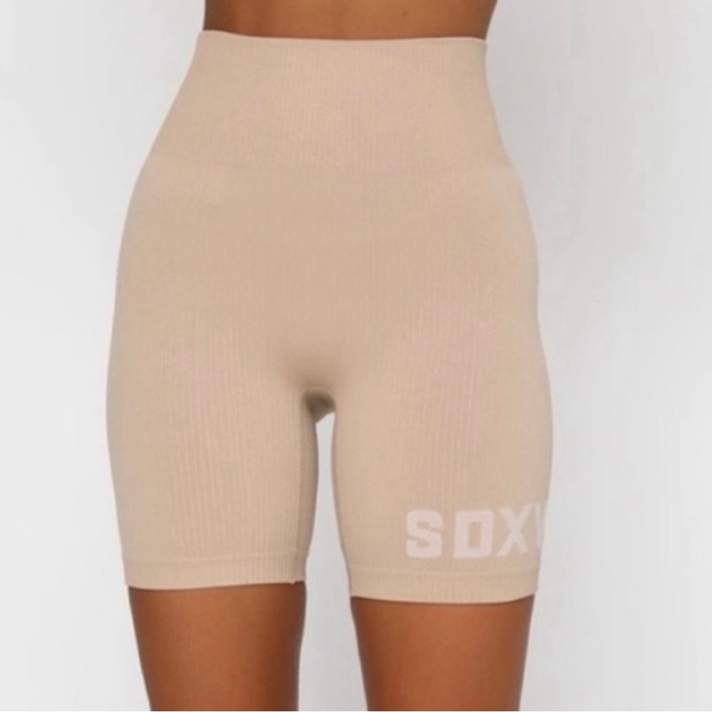 White Fox X Sarah’s Day tan rubbed biker shorts.